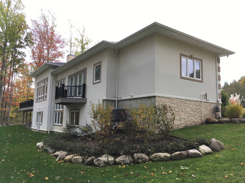 Rear of a contemporary ranch custom home