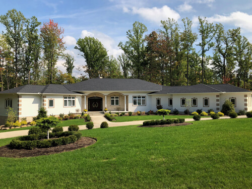 Front of a contemporary ranch custom home