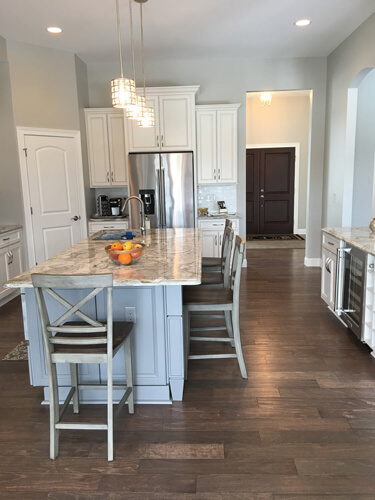 Kitchen island and refrigerator