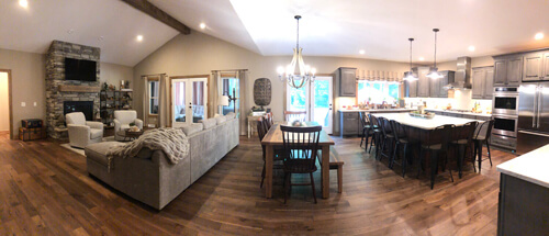 Panoramic image of the great room and kitchen